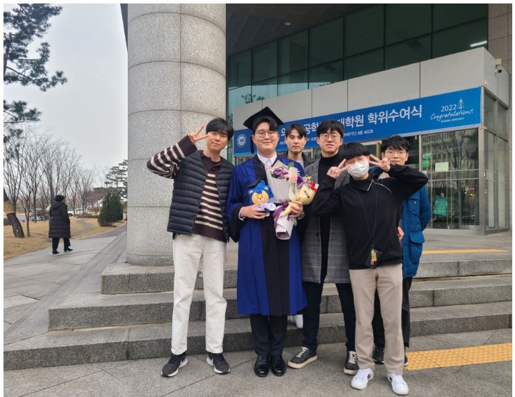 Graduation photo welcoming new graduate students