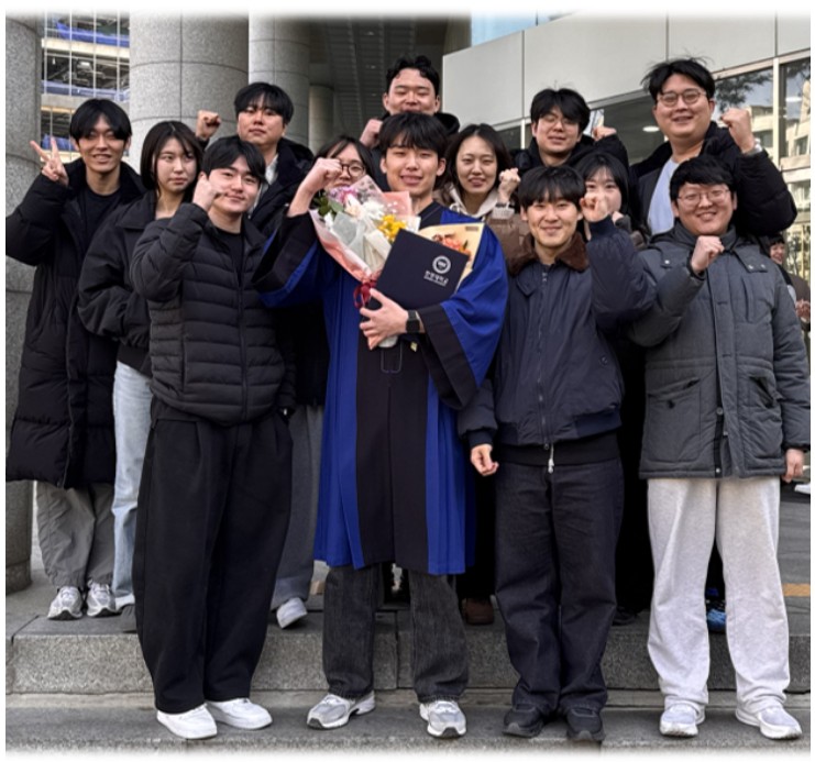 Group photo celebrating graduation and graduate school admission